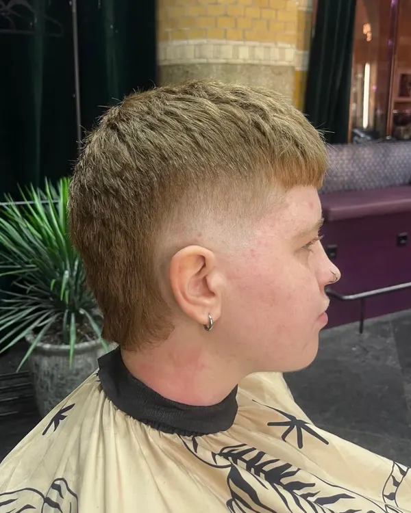 Textured mullet with a burst fade