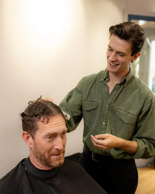 Ryan chatting with a client during a cut